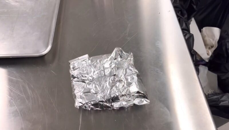 cover the pizza with aluminum foil