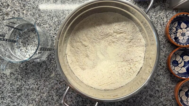 Mixing flour, yeast, and salt